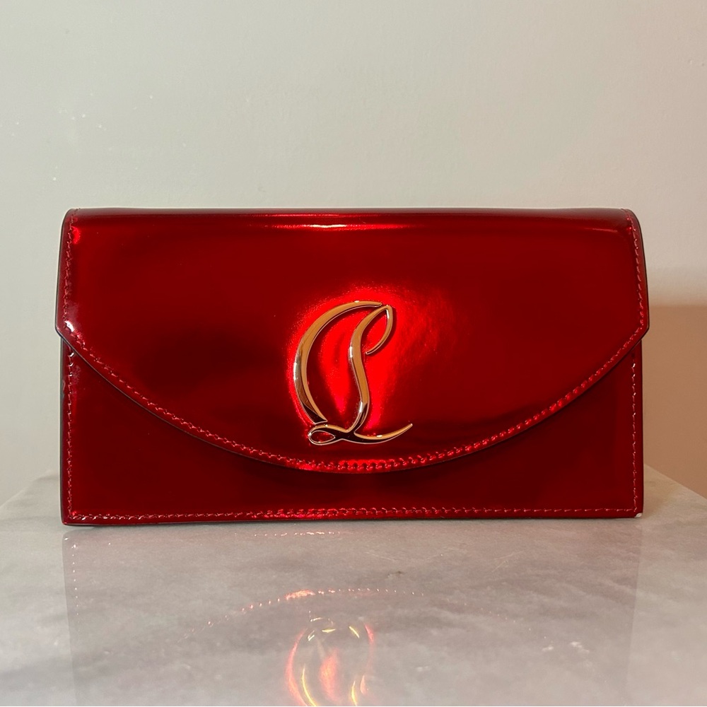 CHRISTIAN LOUBOUTIN
Loubi54 patent leather clutch